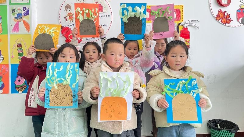 播种绿色 拥抱春天——张甸幼儿园植树节主题活动
